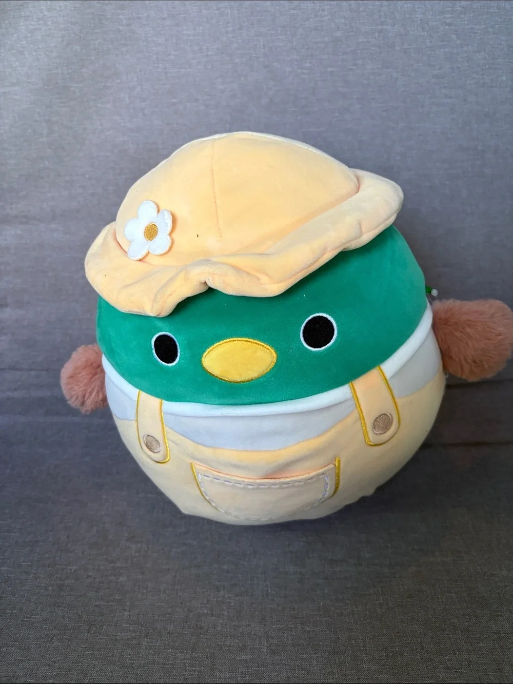 This is the Squishmallows Avery the Mallard Duck in Yellow Overalls plush
